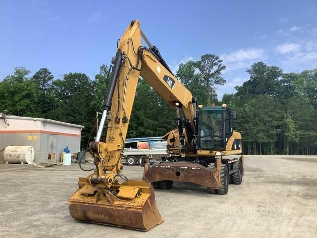 CAT M322D Hjulgravere