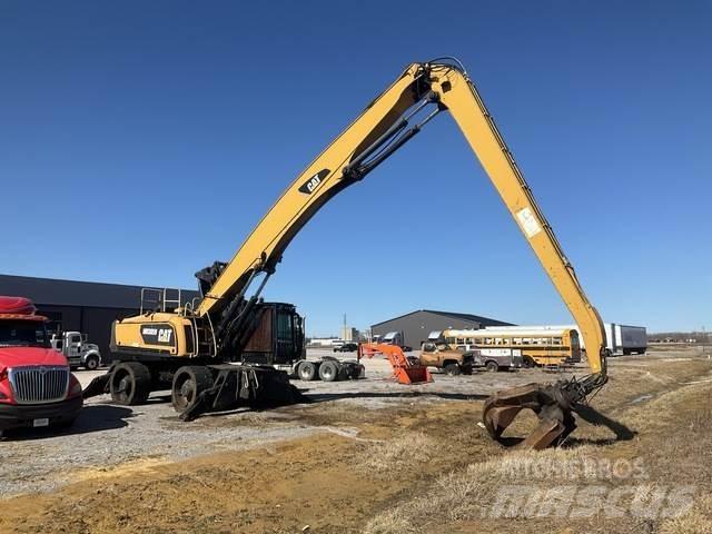 CAT MH3059 Gravemaskiner for avfallshåndtering
