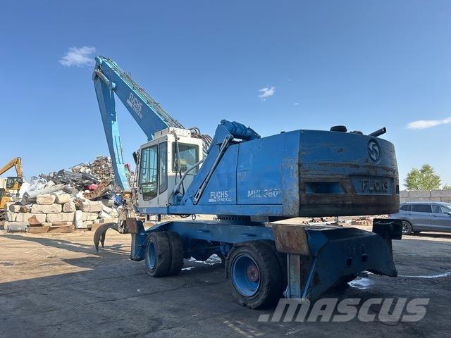 Fuchs MHL360 Gravemaskiner for avfallshåndtering