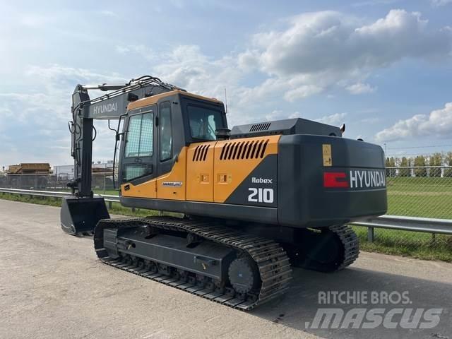 Hyundai R210 Beltegraver