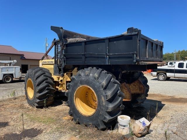 John Deere  Rammestyrte Dumpere