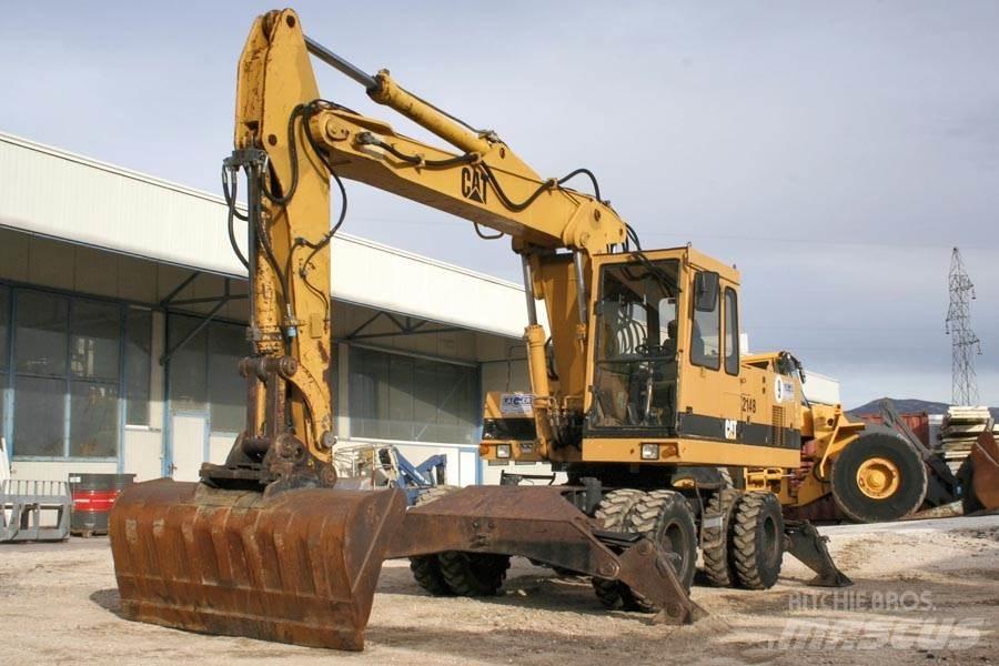 CAT 214B Hjulgravere