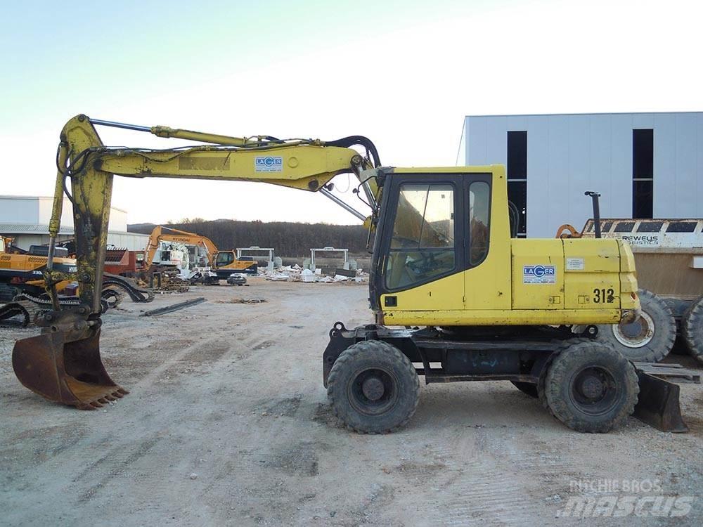 CAT M312 Hjulgravere