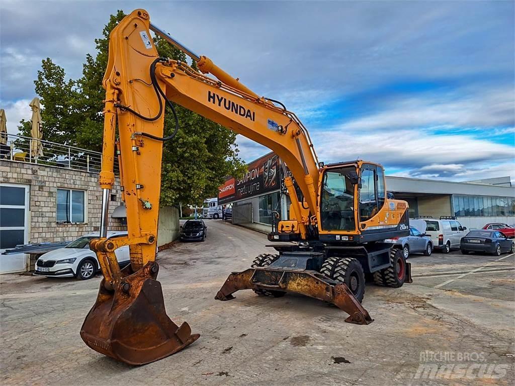 Hyundai R210W-9 Hjulgravere