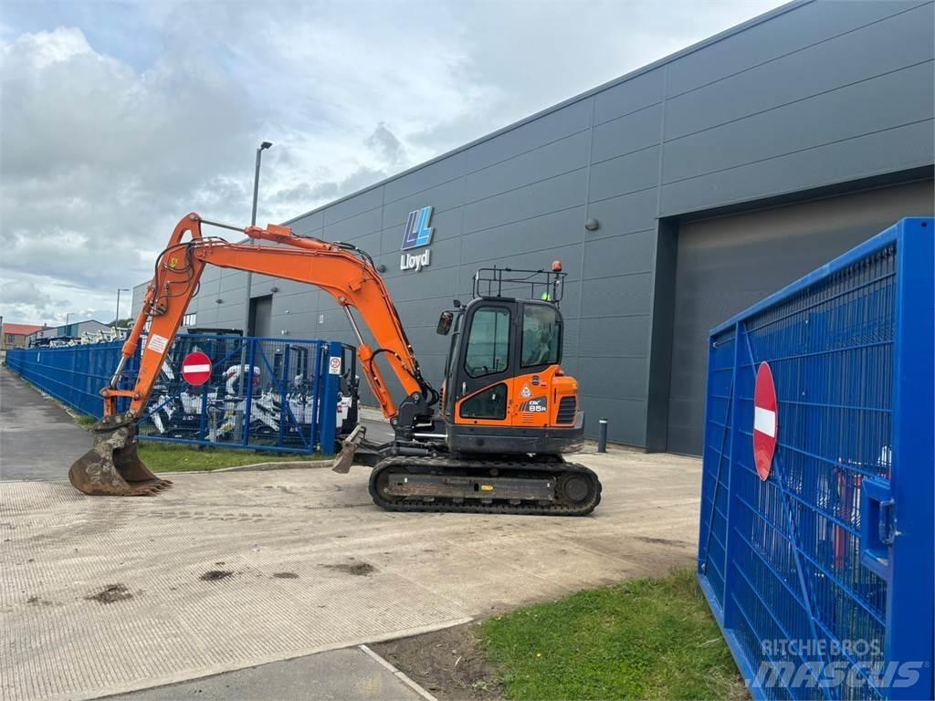 Develon DX85R-3 Beltegraver