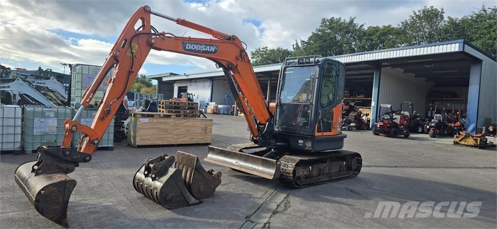Doosan DX60R Beltegraver