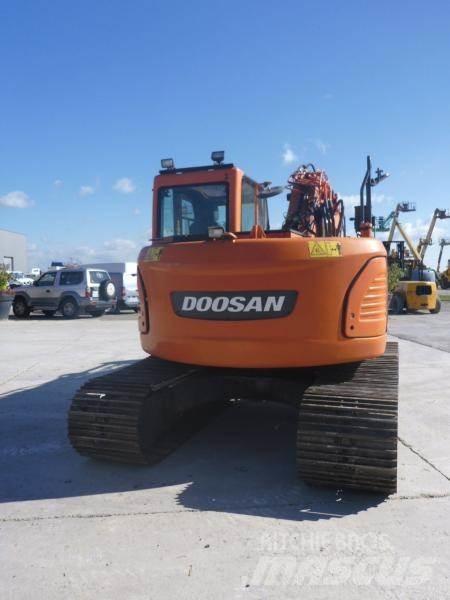 Doosan DX140LC Beltegraver