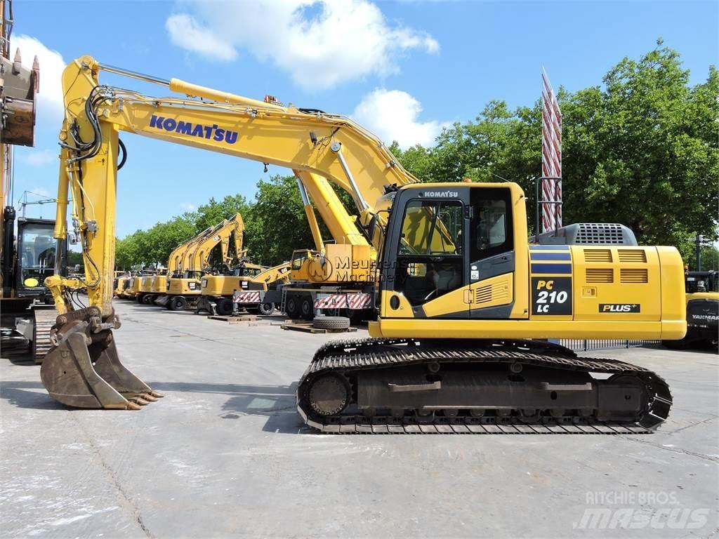 Komatsu PC210LC-10 Beltegraver