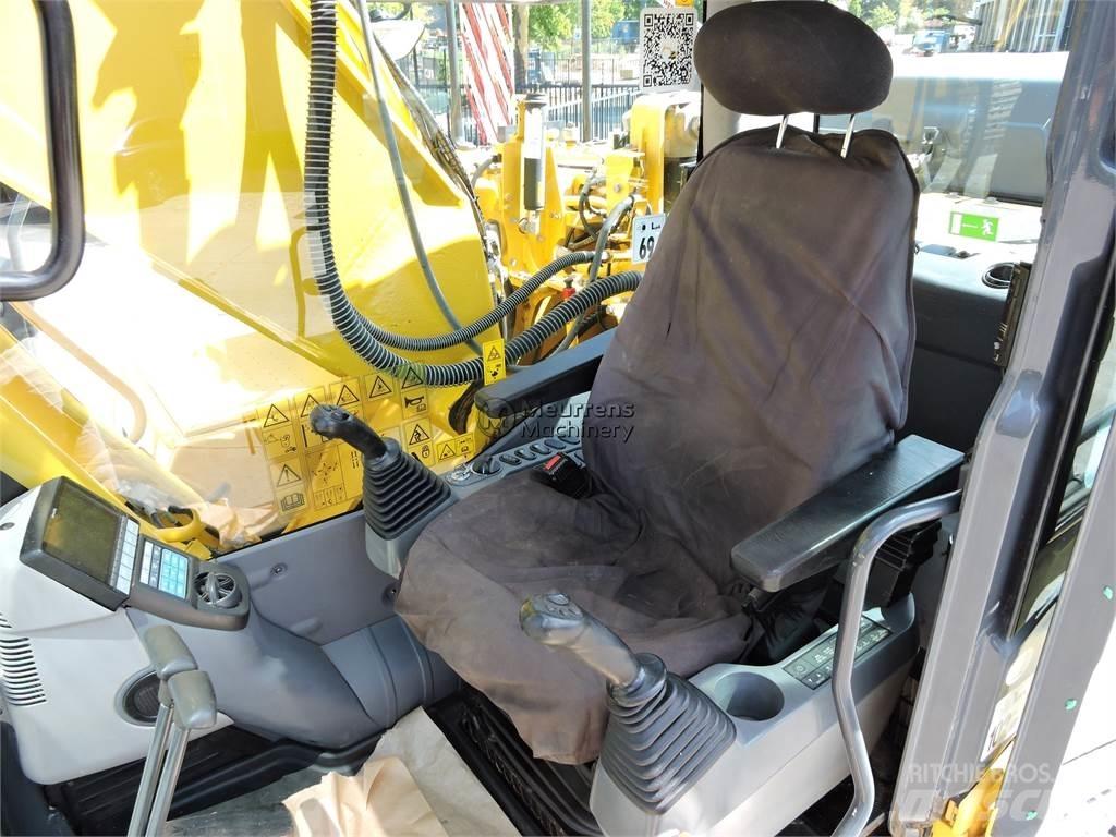 Komatsu PC210LC-10 Beltegraver