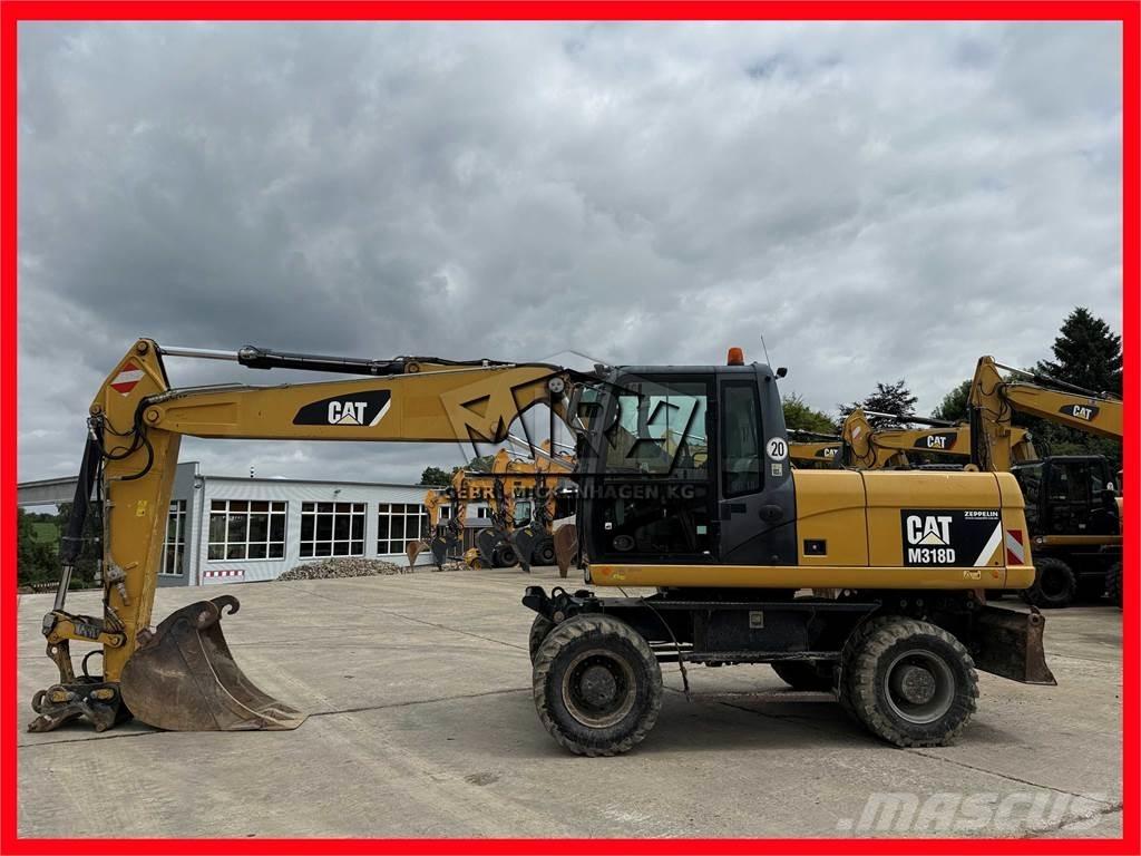 CAT M 318 D Hjulgravere