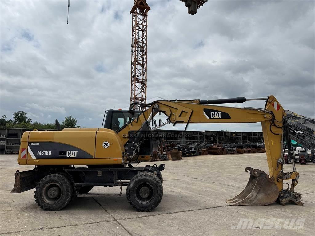 CAT M 318 D Hjulgravere