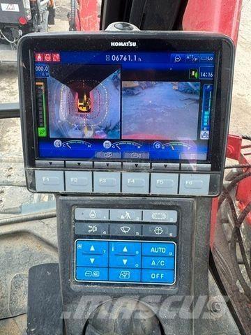 Komatsu 138US-11 Beltegraver