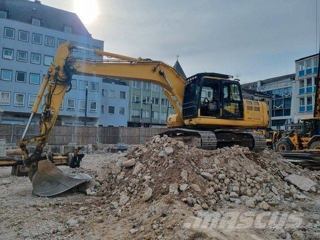 Komatsu PC210LC11 Beltegraver
