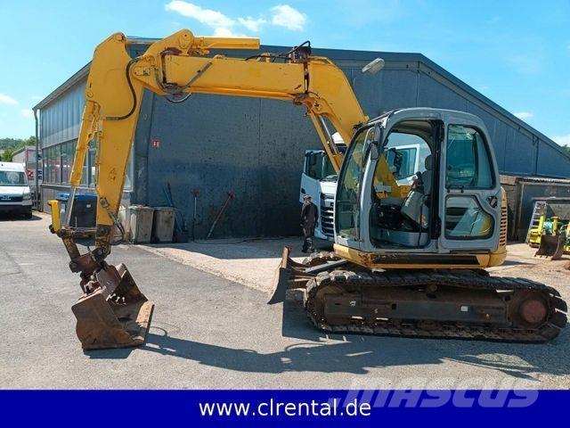 New Holland E70SR 4 Beltegraver