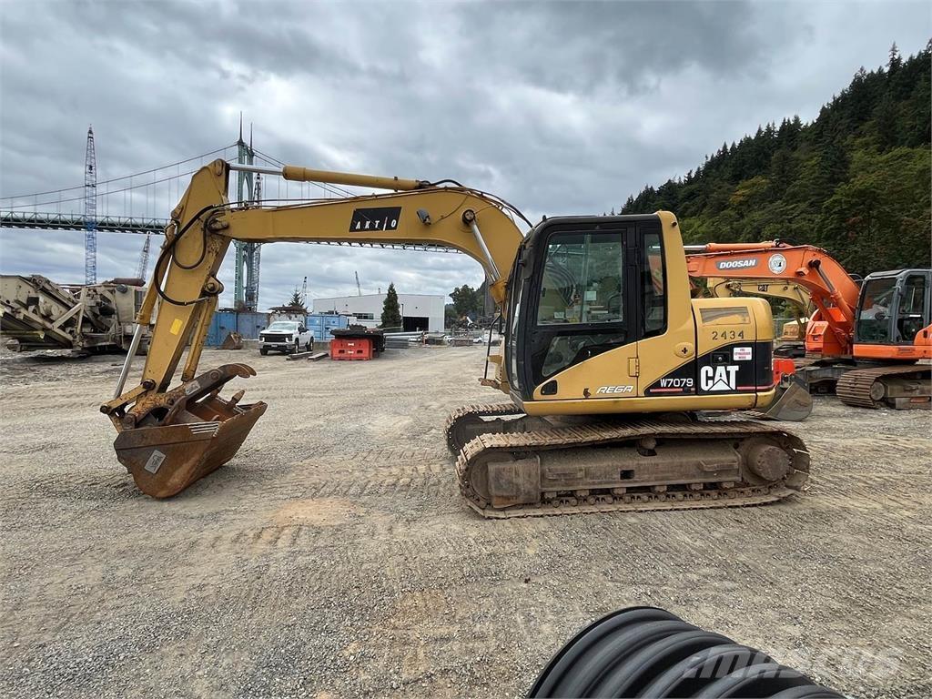 CAT 311C Beltegraver