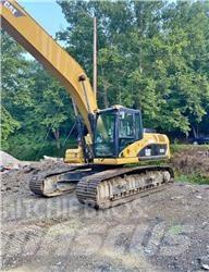 CAT 324DL Gravemaskiner med lang bom