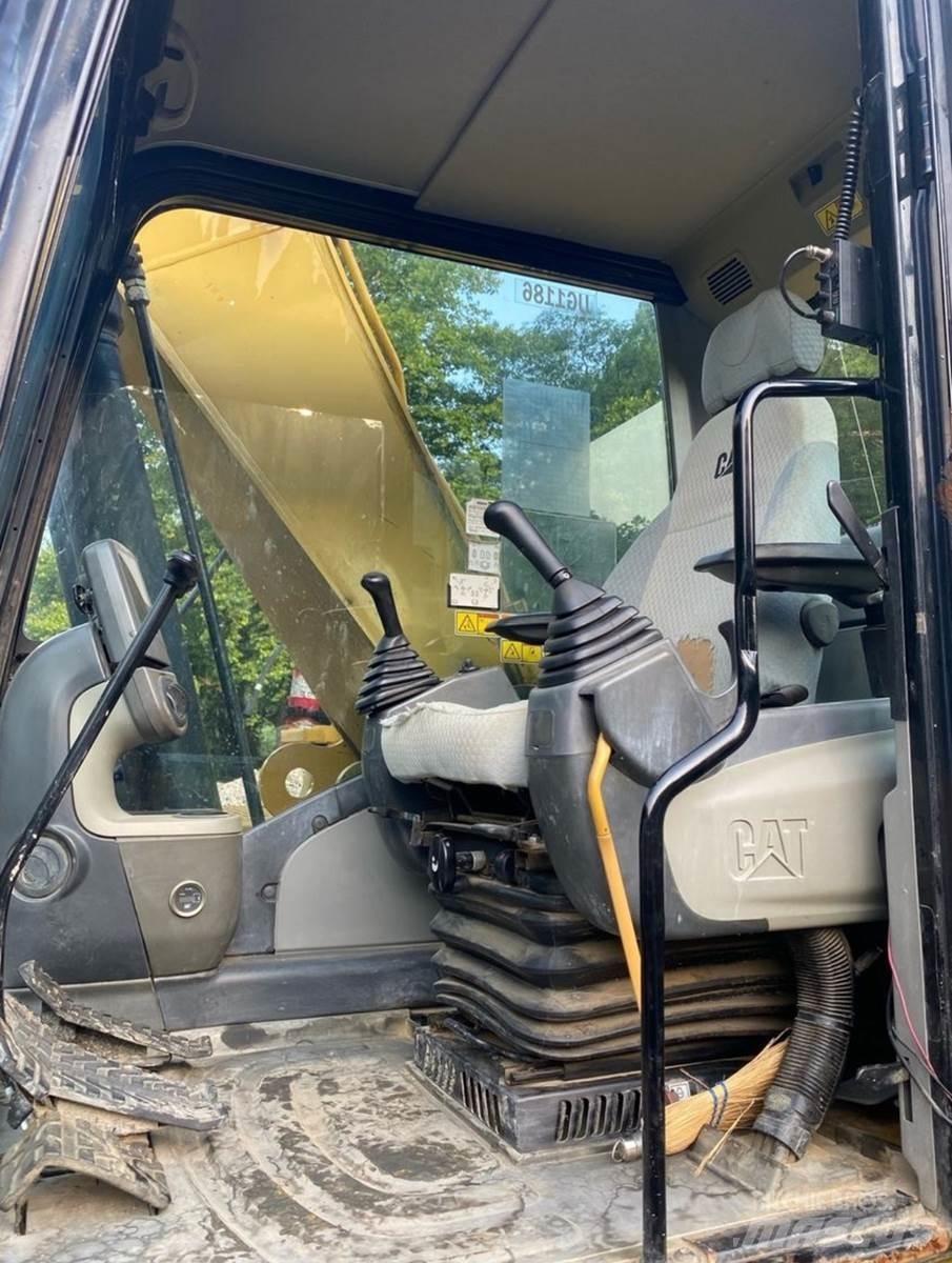CAT 324DL Gravemaskiner med lang bom