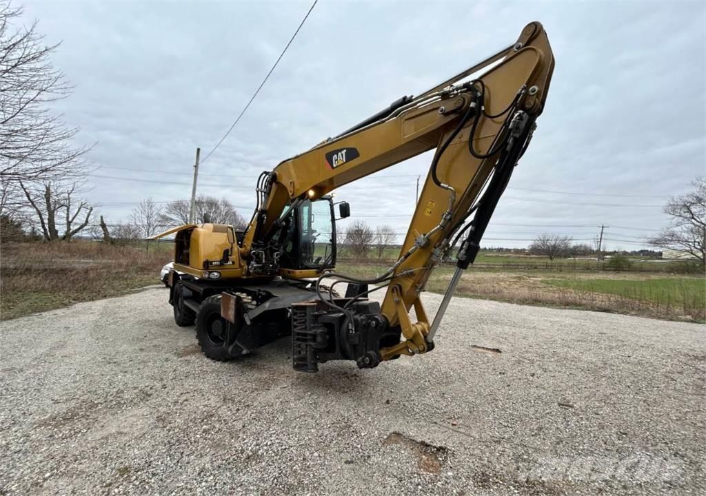 CAT M313D Hjulgravere