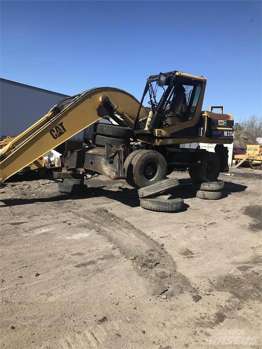 CAT M318 Hjulgravere