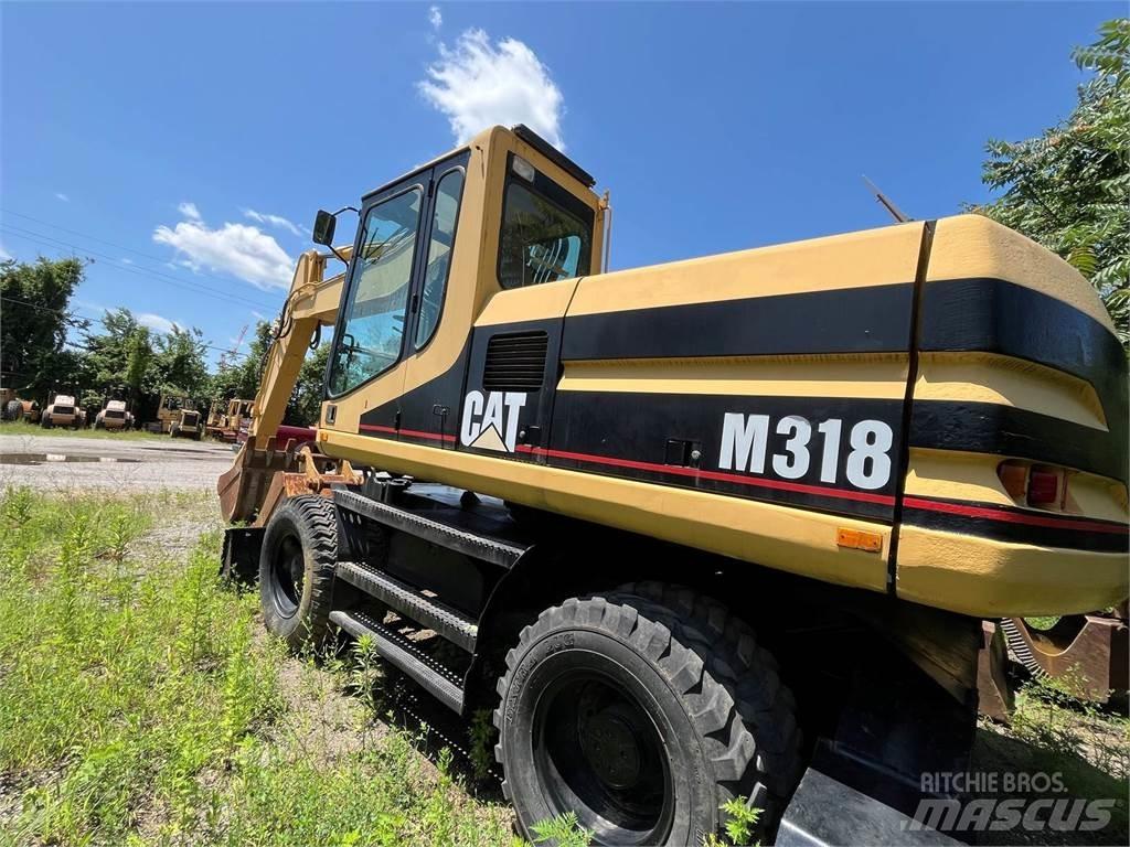 CAT M318 Hjulgravere