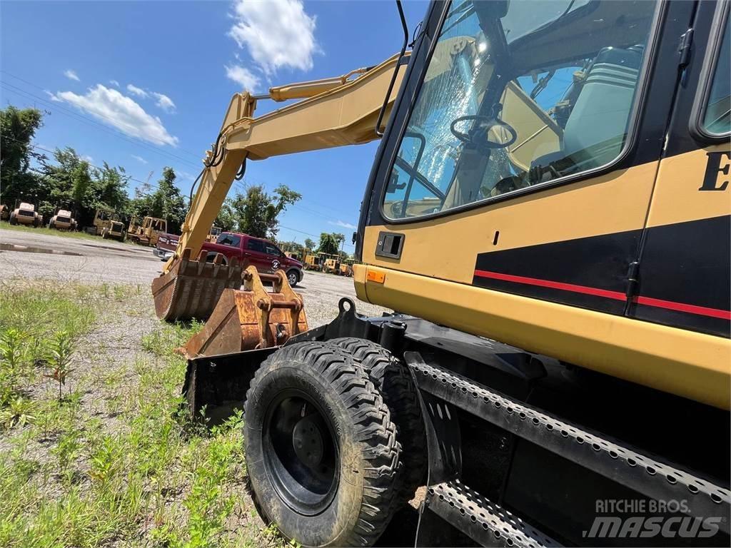 CAT M318 Hjulgravere