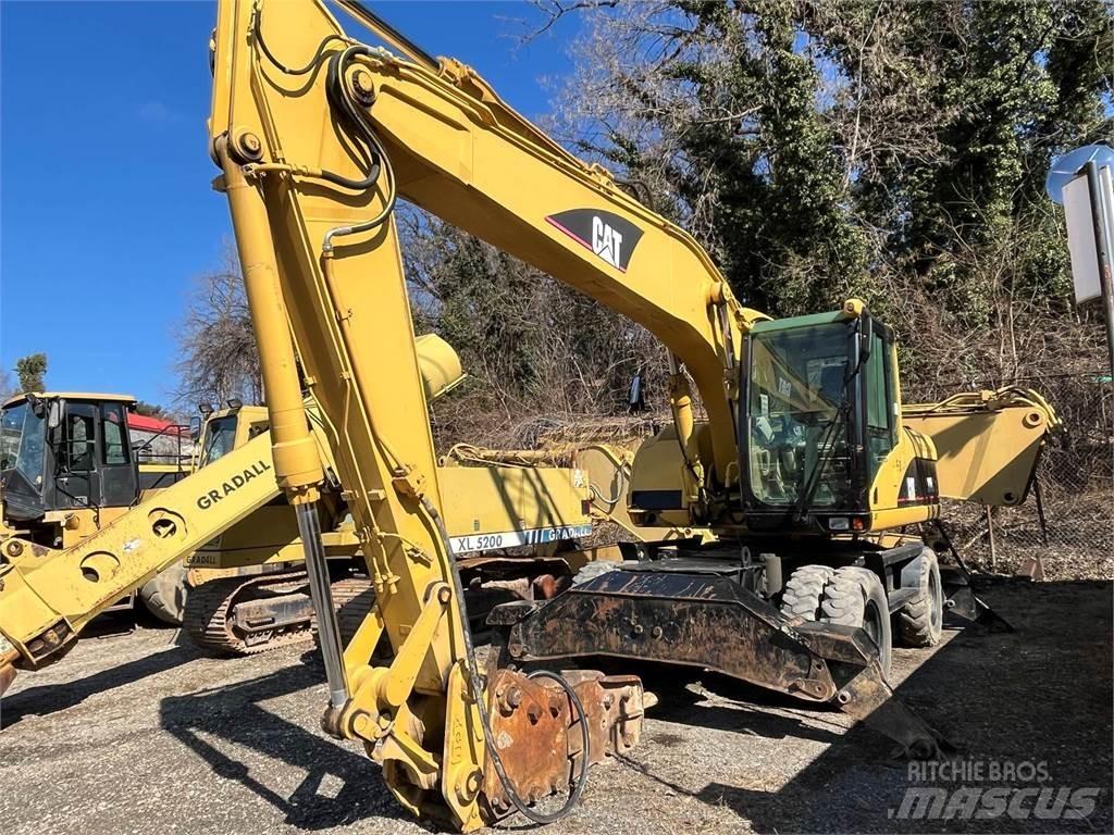 CAT M318C Hjulgravere