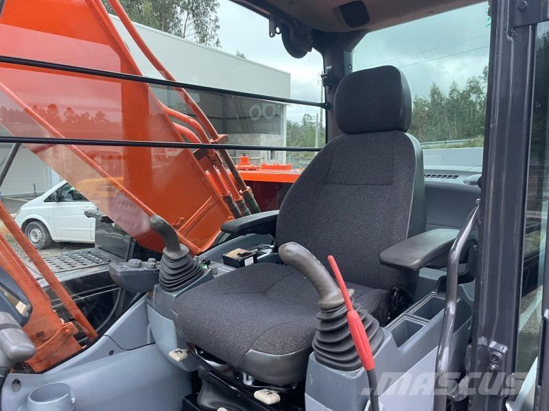 Hitachi ZX210 Beltegraver