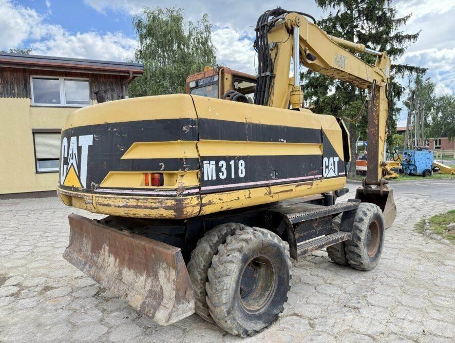 CAT M318 Hjulgravere