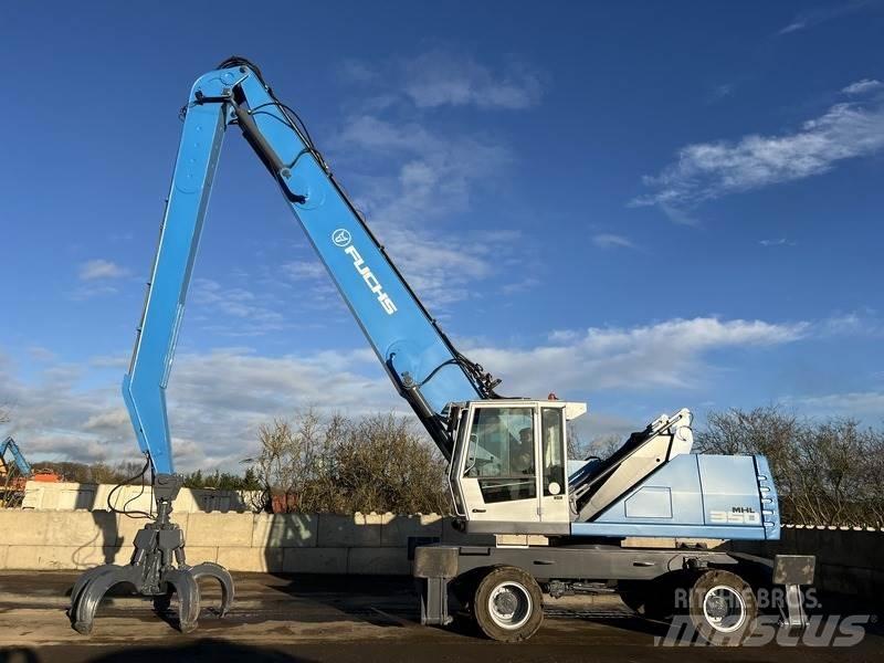 Fuchs MHL 350 Gravemaskiner for avfallshåndtering