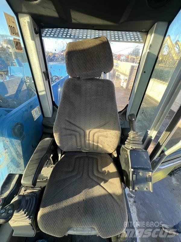 Fuchs MHL 350 Gravemaskiner for avfallshåndtering
