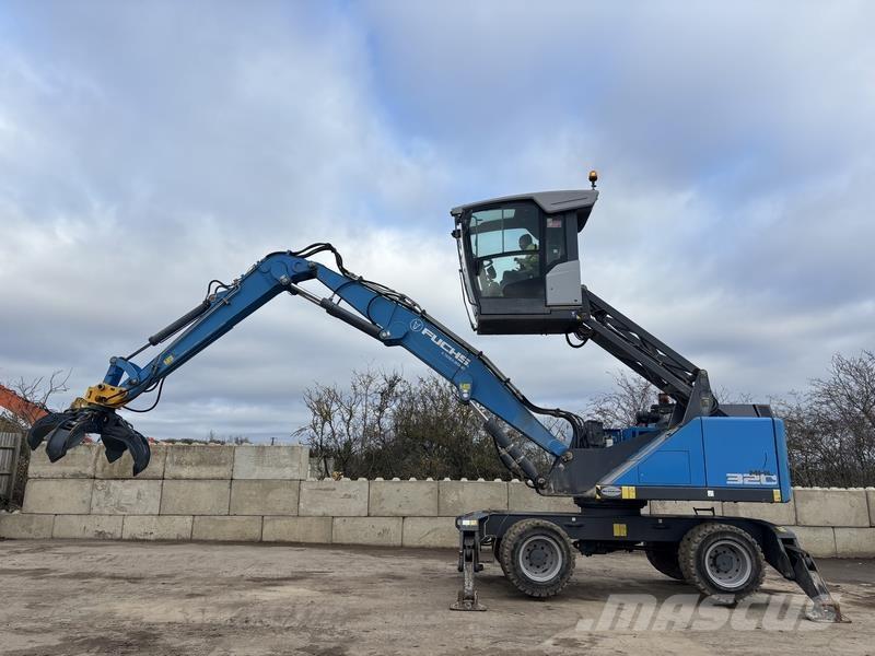 Fuchs MHL320 Gravemaskiner for avfallshåndtering