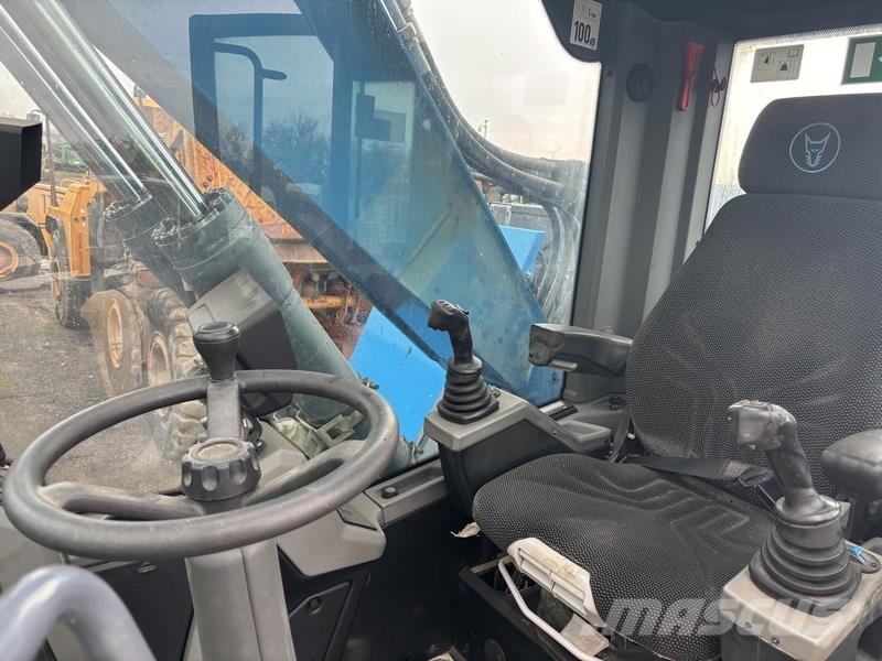 Fuchs MHL320 Gravemaskiner for avfallshåndtering