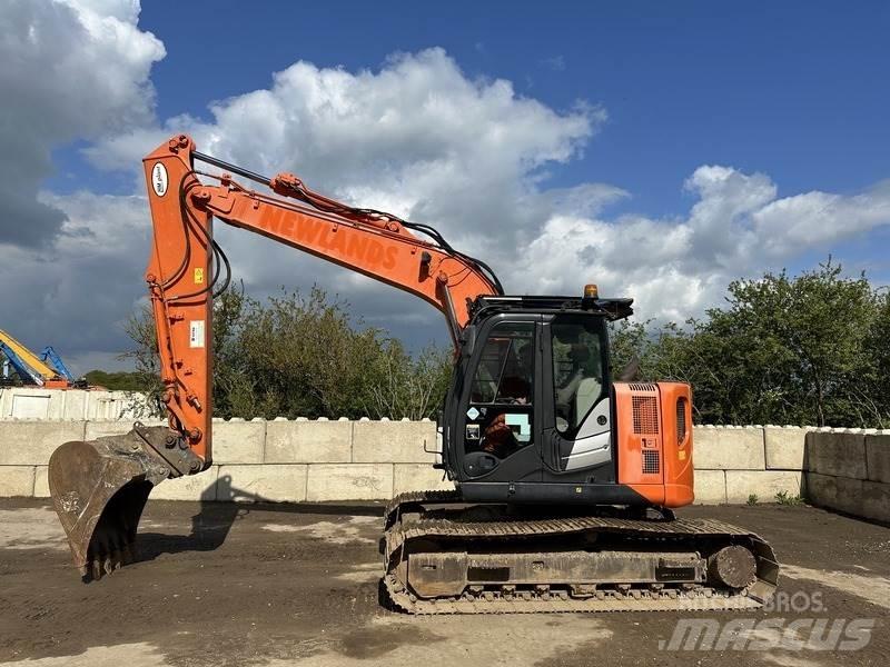 Hitachi ZX135 Beltegraver