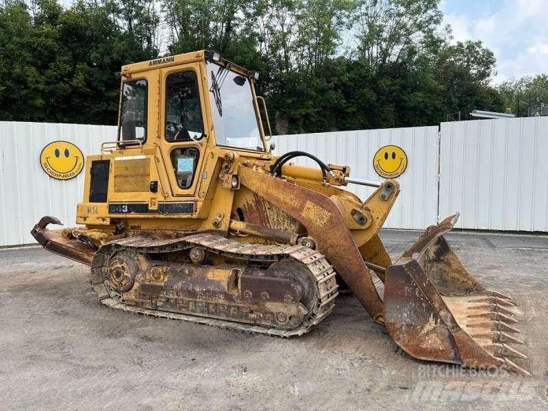 CAT 943 Beltelastere