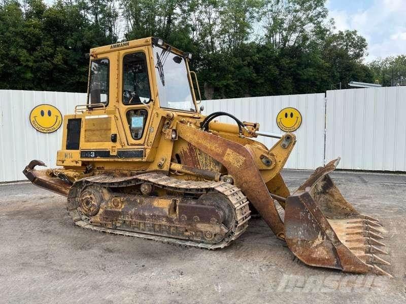 CAT 943 Beltelastere