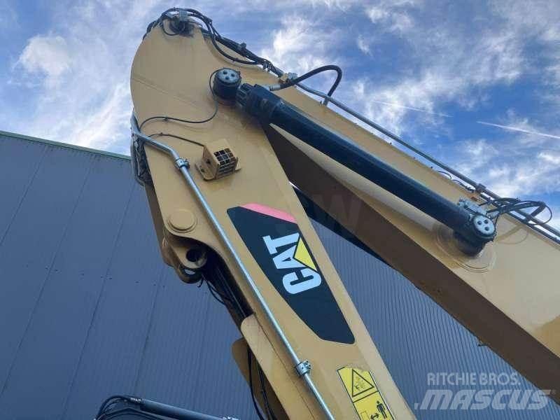 CAT MH3022 Gravemaskiner for avfallshåndtering