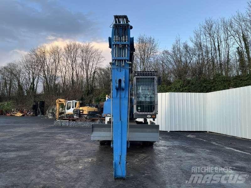 Fuchs MHL320 Gravemaskiner for avfallshåndtering