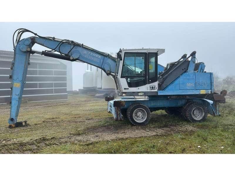 Fuchs MHL320 Gravemaskiner for avfallshåndtering