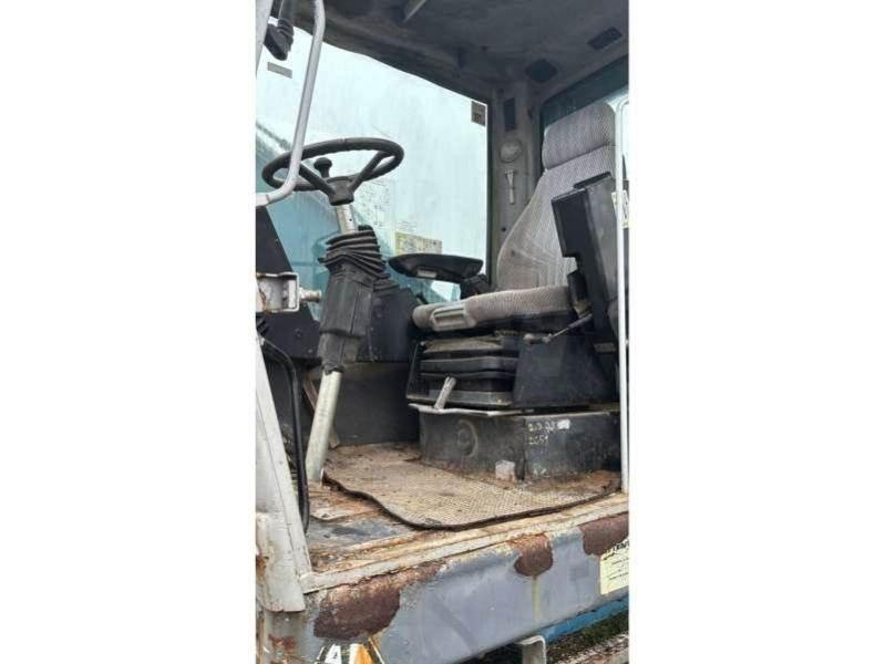 Fuchs MHL320 Gravemaskiner for avfallshåndtering