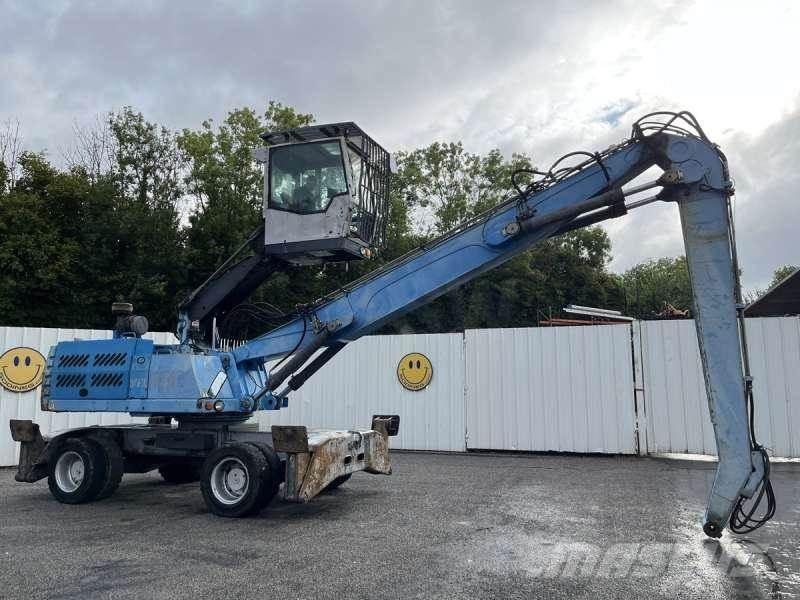 Fuchs MHL335 Gravemaskiner for avfallshåndtering