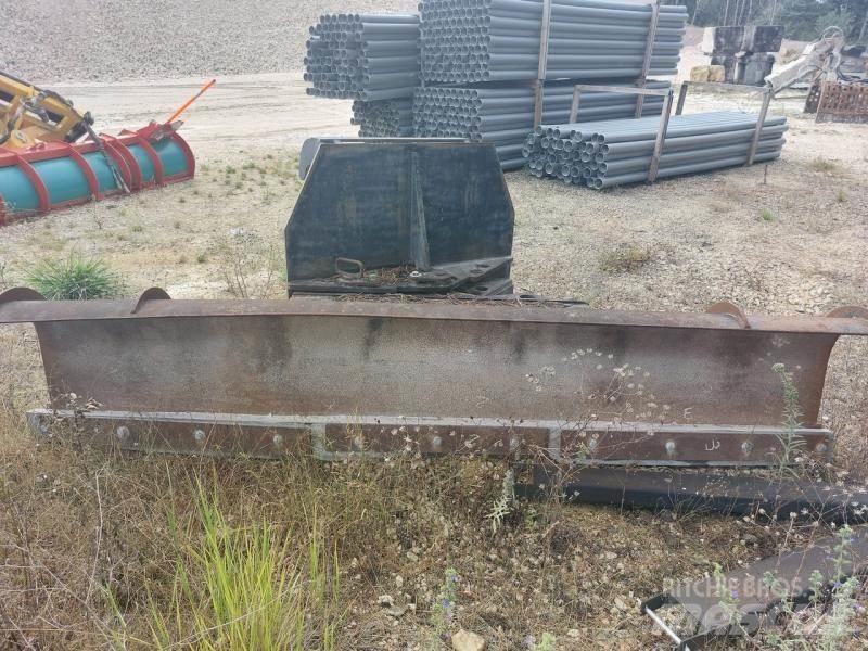 CAT 938 Ploger