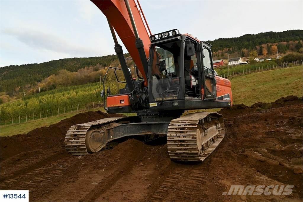 Doosan 300 DX LC-5 with lots of equipment. Taken out in 2 Beltegraver