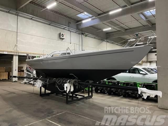 Volvo L90M  Marieholm IF26 classic sailingyacht Hjullastere