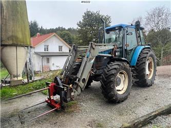 New Holland TS110 4x4 tractor w/ Quicke 640 front loader