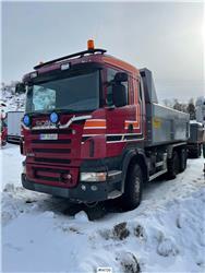 Scania R500 6x4 plow-rigged tipper.