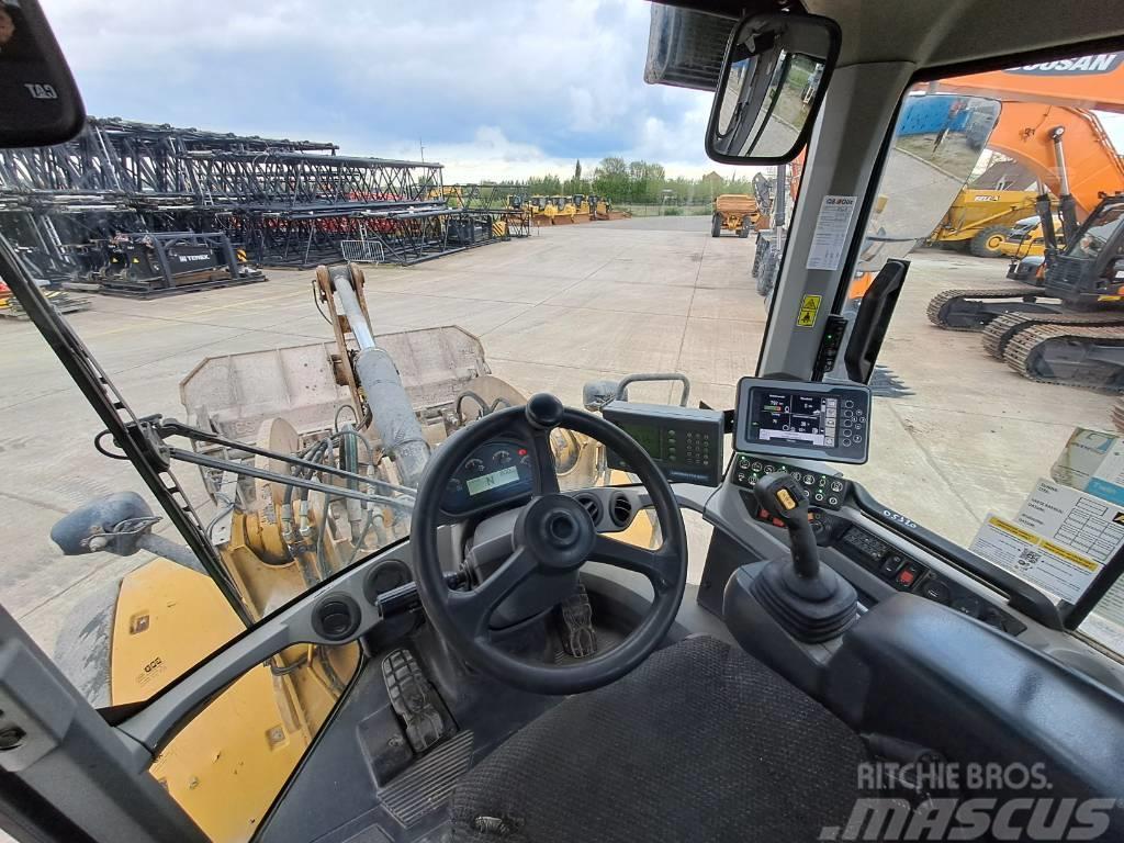 CAT 938M (with round steer) Hjullastere