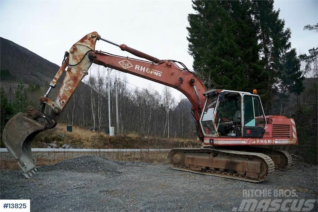 O&K RH6 Tracked excavator with digging bucket. WATCH V Beltegraver