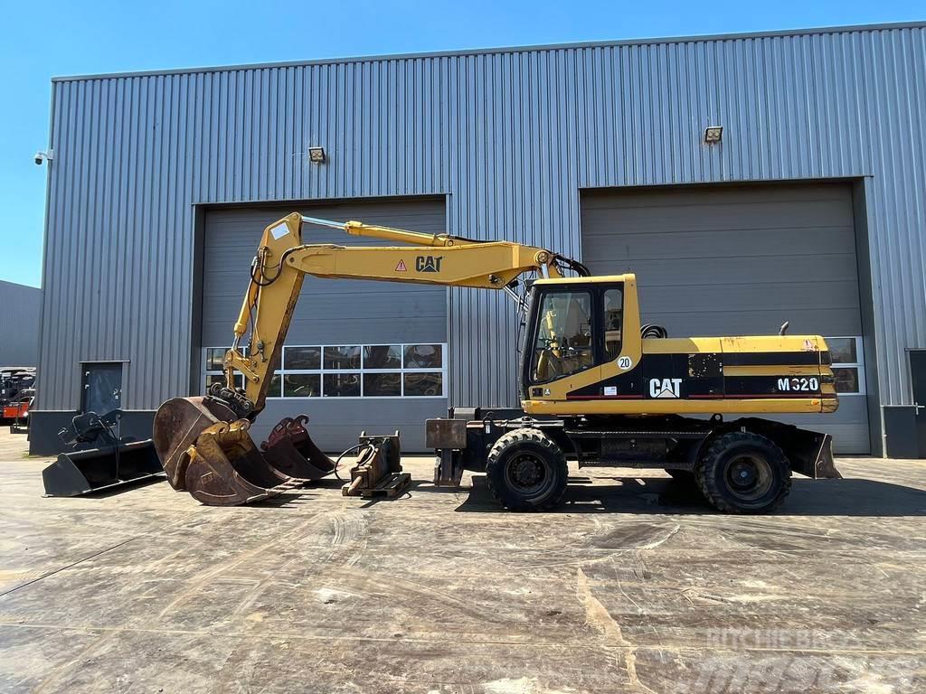 CAT M320 complete with 4 buckets and hammer available Hjulgravere