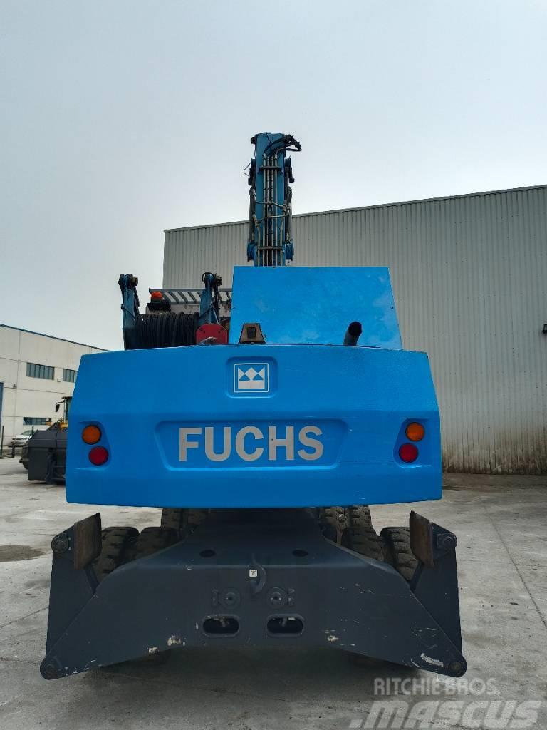 Fuchs MHL 320 Gravemaskiner for avfallshåndtering