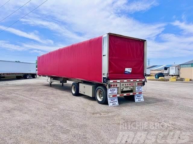 East Mfg FLATBED WITH ROLLING TARP Kapell trailer/semi